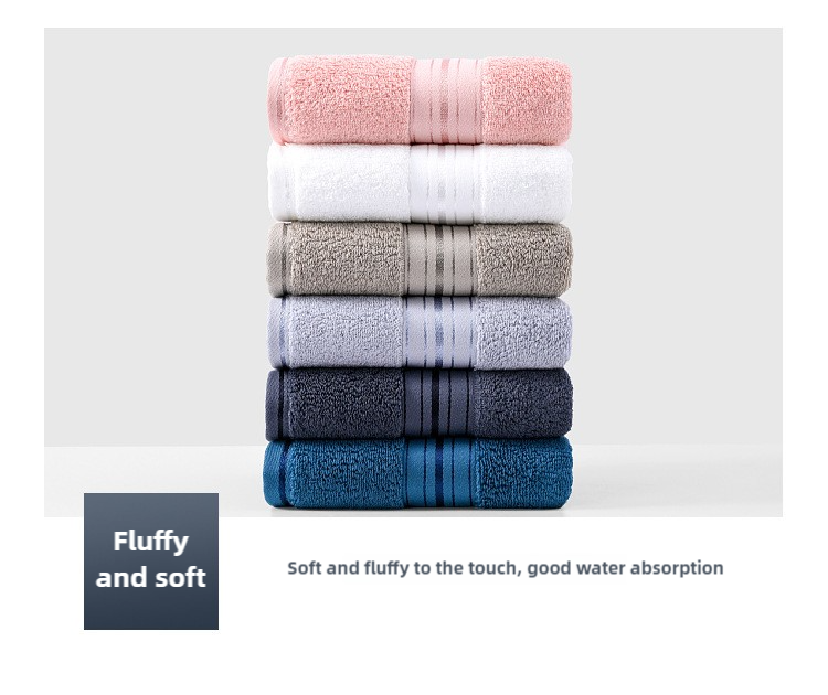 Cotton towel set stacked in pink, white, gray, and blue with matching bands