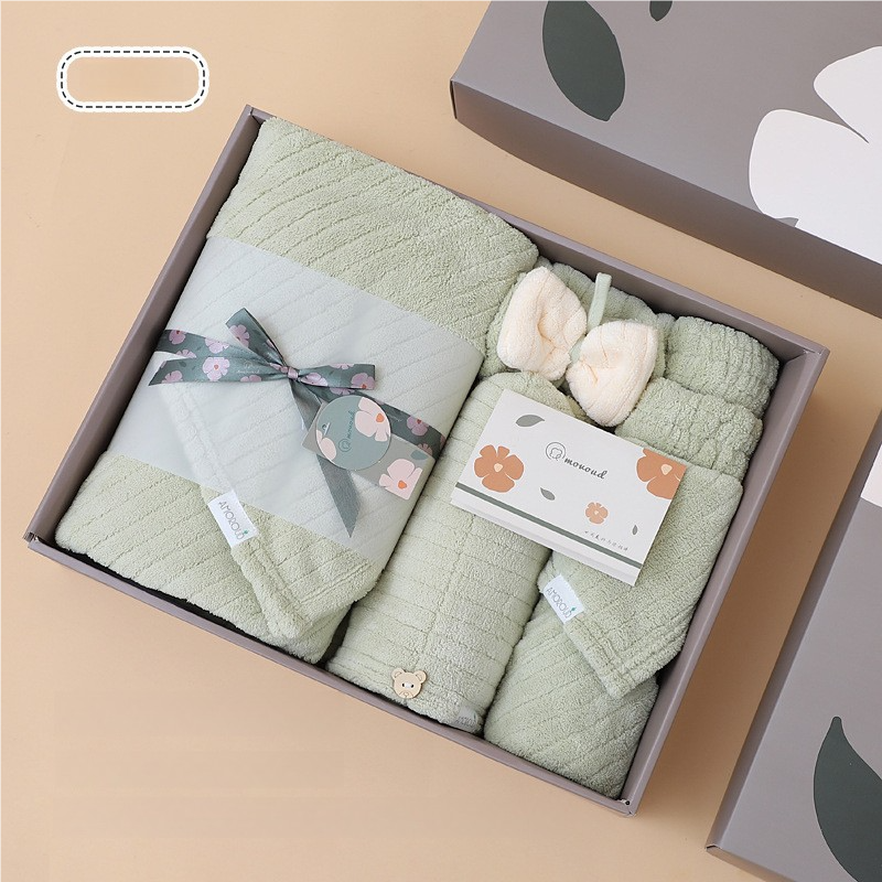 Green fleece towel gift set in gift box with folded towels and washcloths