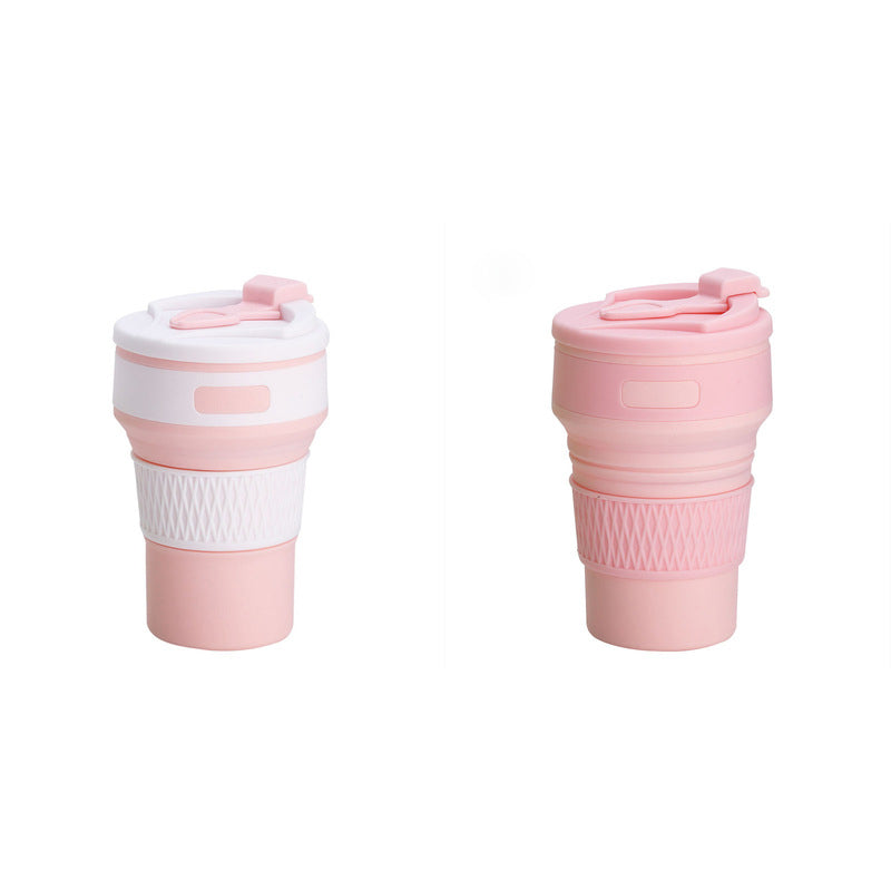 Pink silicone collapsible travel coffee cup with folding lid and textured sleeve, two-pack