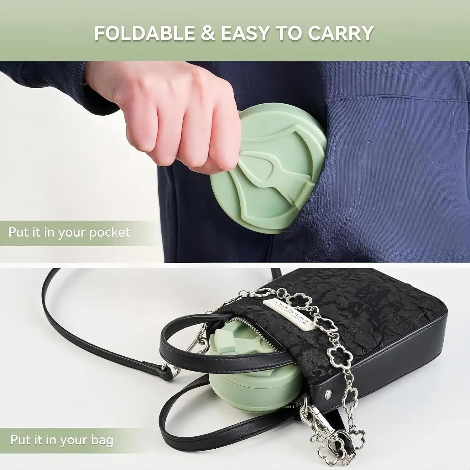 Green collapsible silicone coffee cup folded in hand, with carry handle for bag