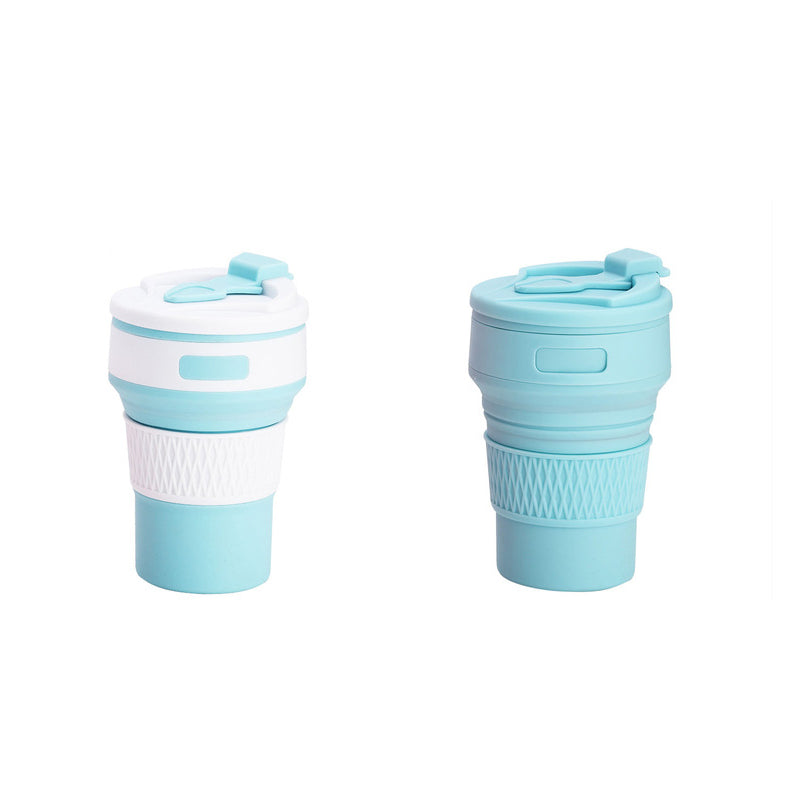 Collapsible silicone travel mug pair with snap-on lid, shown folded with blue bases