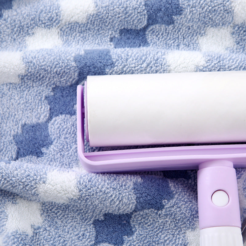 Purple coral fleece towel with blue star pattern and purple edge sleeve, plush pile