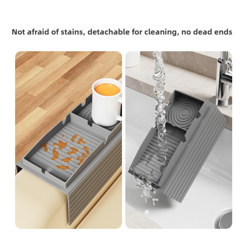 Grey silicone sofa armrest tray with raised edges for easy cleaning and drainage