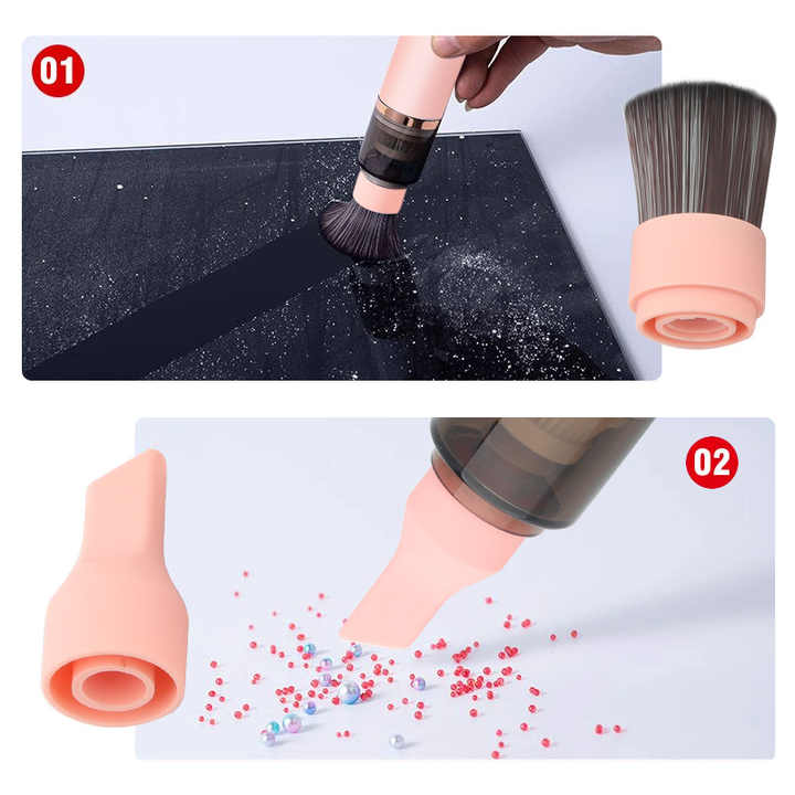 Pink dust vacuum nozzle with soft bristle head, shown picking up debris