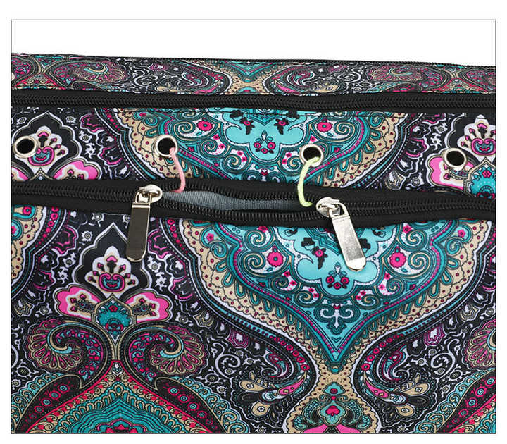 Paisley patterned crochet yarn storage bag front close-up with metal zipper pulls
