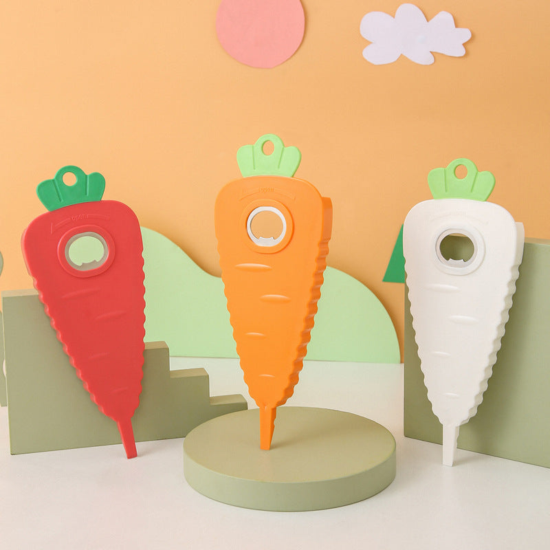 Carrot-shaped bottle openers in red, orange, and white with green pull tabs