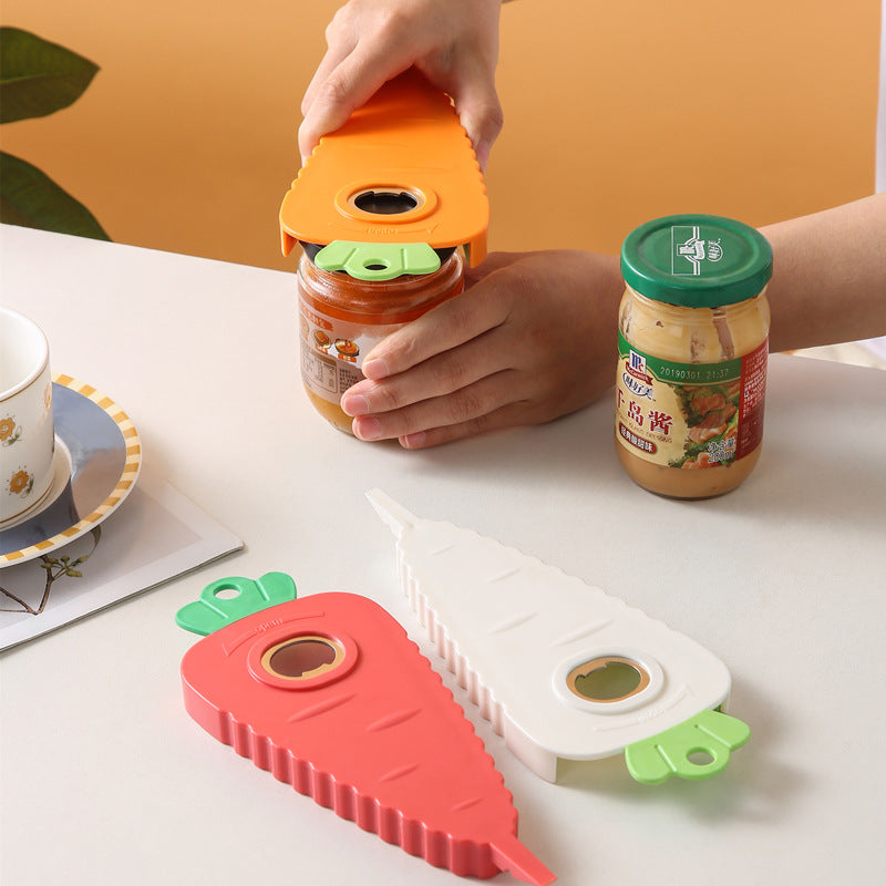 Carrot-shaped bottle opener set, pink and white with green loops on tabletop