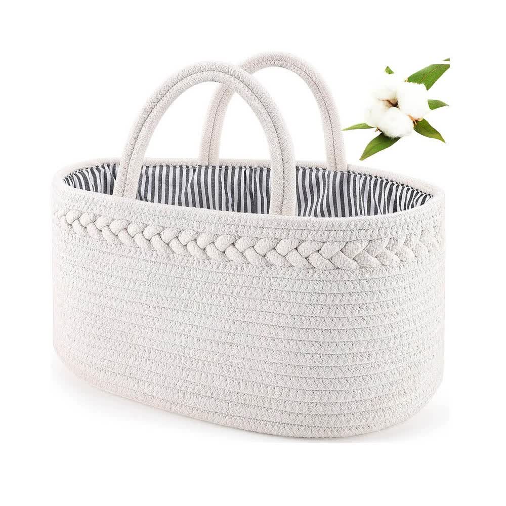 White cotton rope storage basket with two loop handles and woven sides.