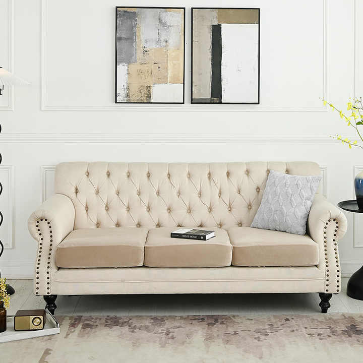 Beige sofa cover set with tufted-style back and buttoned arm details on sofa