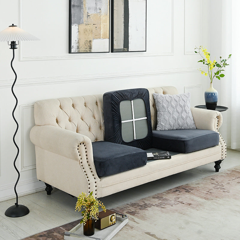 Sofa cover in dark gray, fitted slipcover with window panel on the backrest.