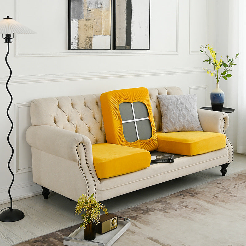 Yellow sofa cover slipcover with square backrest panel and stitched elastic edge