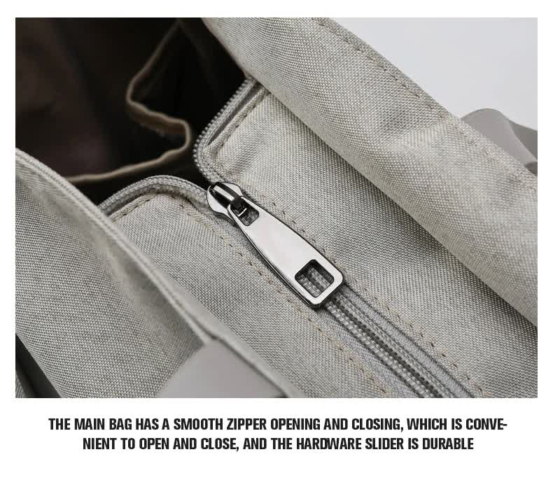 Khaki diaper bag main compartment zipper with metal pull and durable slider clip