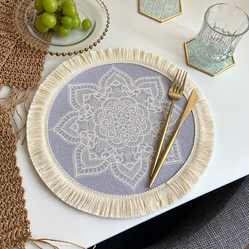 Boho woven cotton placemat set, round blue-and-purple pattern with cream fringe