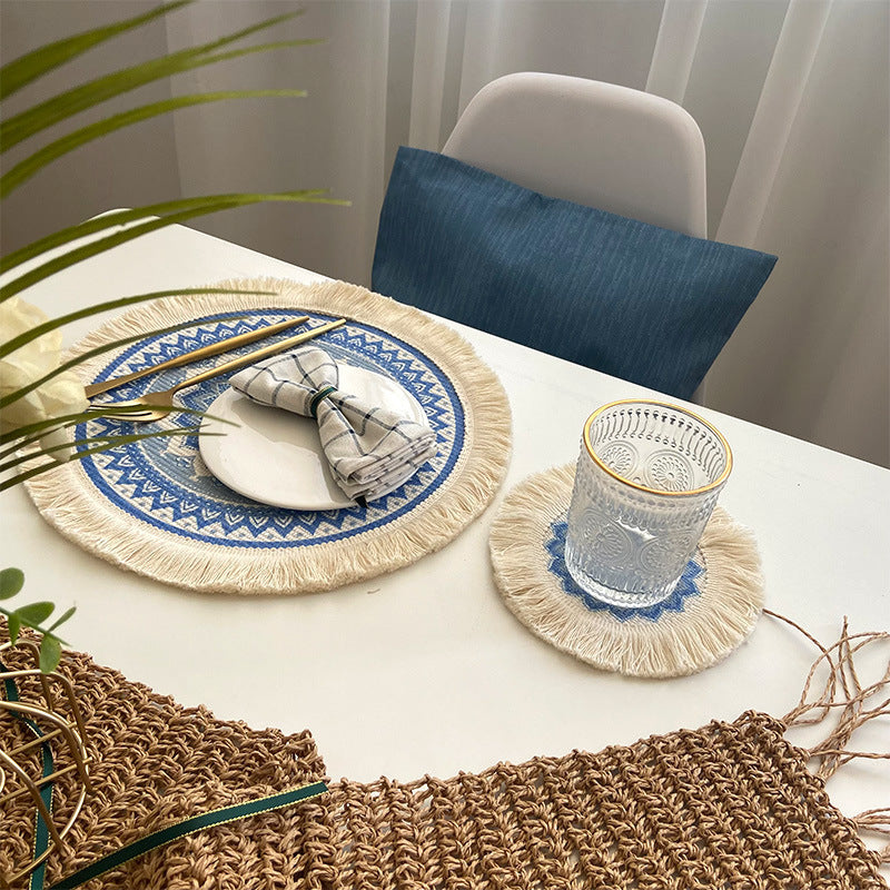 Round woven cotton placemat, blue patterned mandala with cream fringe tassels