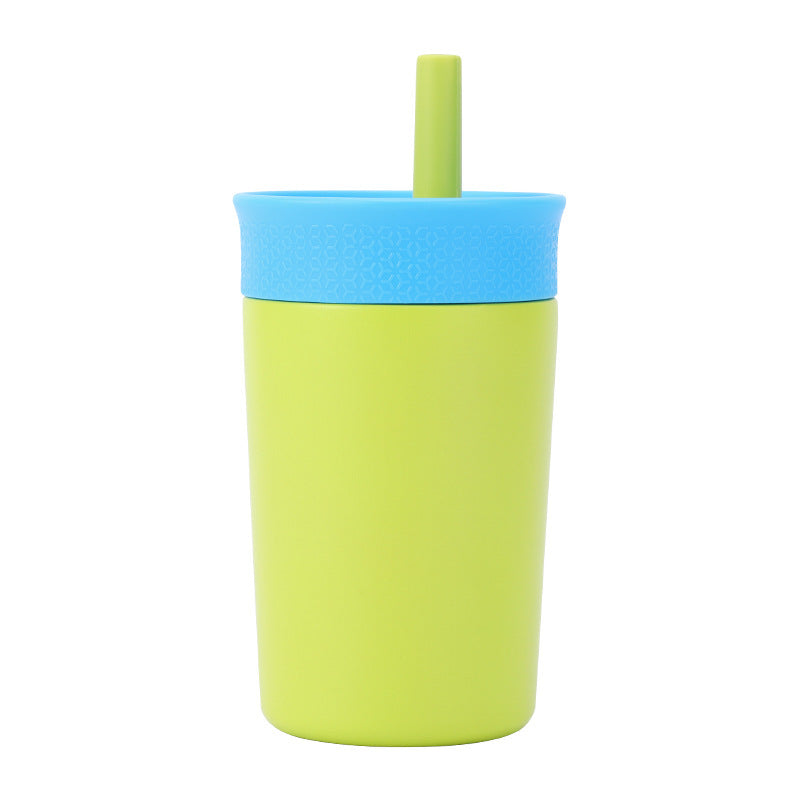 Green insulated tumbler with lid and straw, smooth double-wall cup.