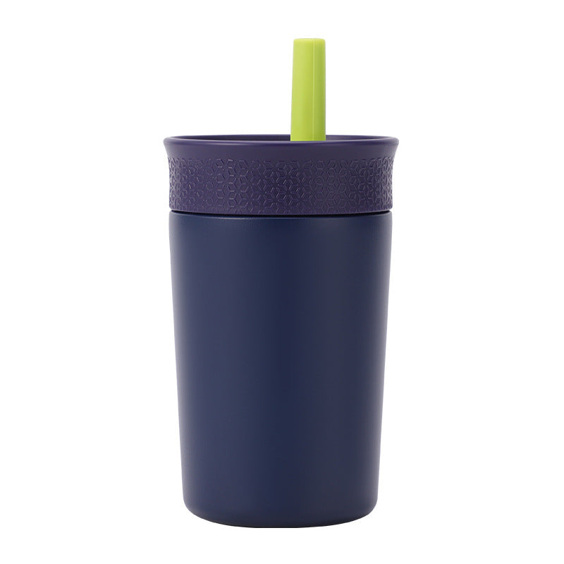Dark blue insulated tumbler with lid and green straw, single cup front view