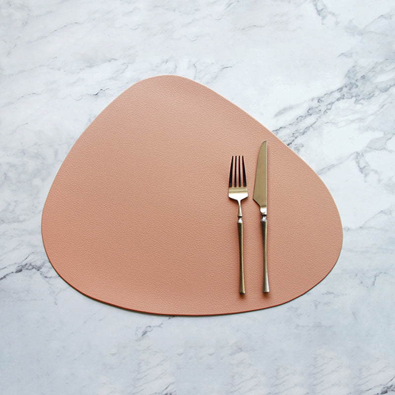 Triangular pink PVC placemat with cutlery set, single mat view