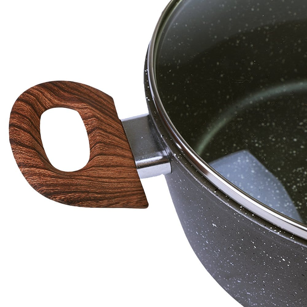 Casserole pot rim with wood-style loop handle on dark speckled surface