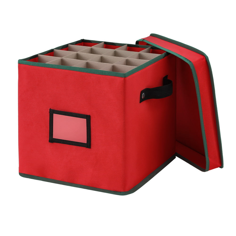 Red fabric bauble storage box with green trim, hinged lid, and divided compartments