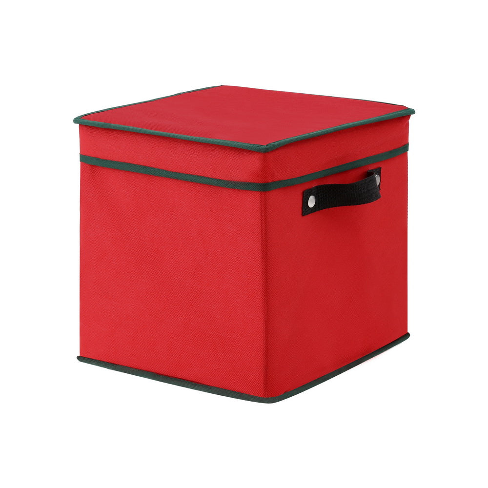 Red fabric ornament storage box with green piping and hinged lid