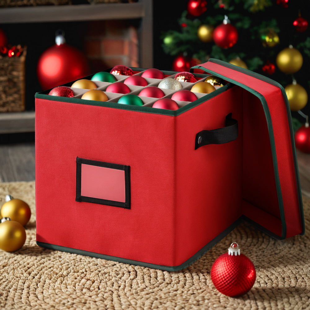 Red bauble storage box with green trim, hinged lid, and ornaments in compartments