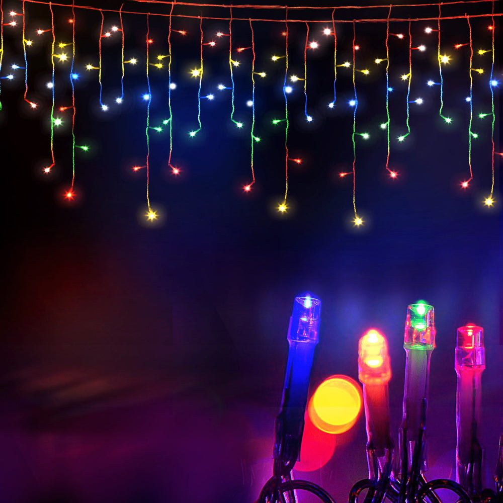 Icicle LED light strand close-up with multicolour glowing bulbs