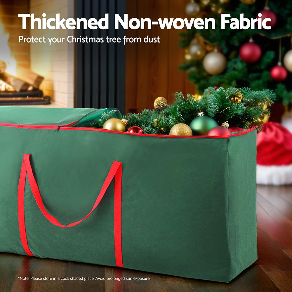 Green Christmas tree storage bag with red handles and open top zipper