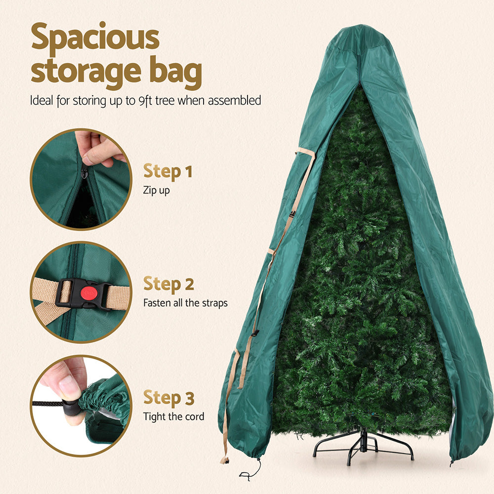 Green tree storage bag standing with artificial tree inside and long fabric side panels