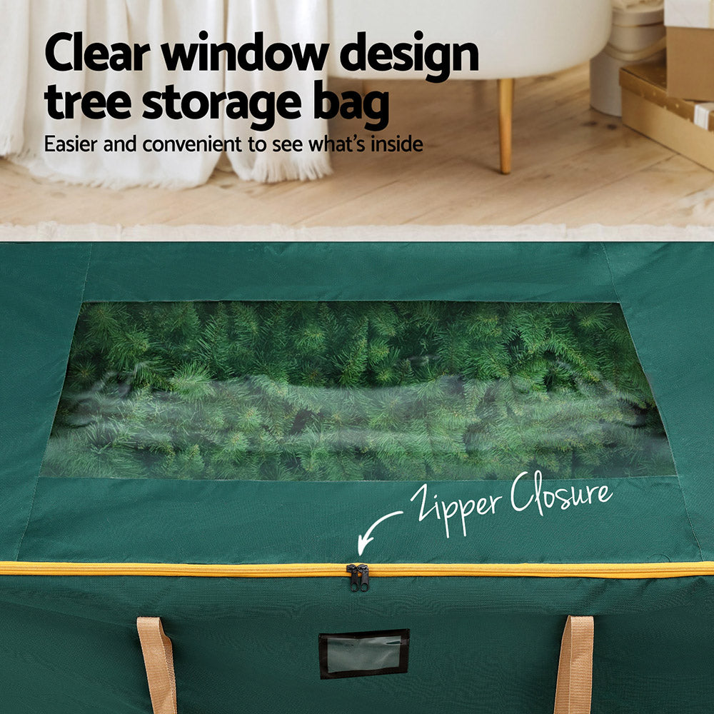 Green Christmas tree storage bag with clear window panel and zipper closure.