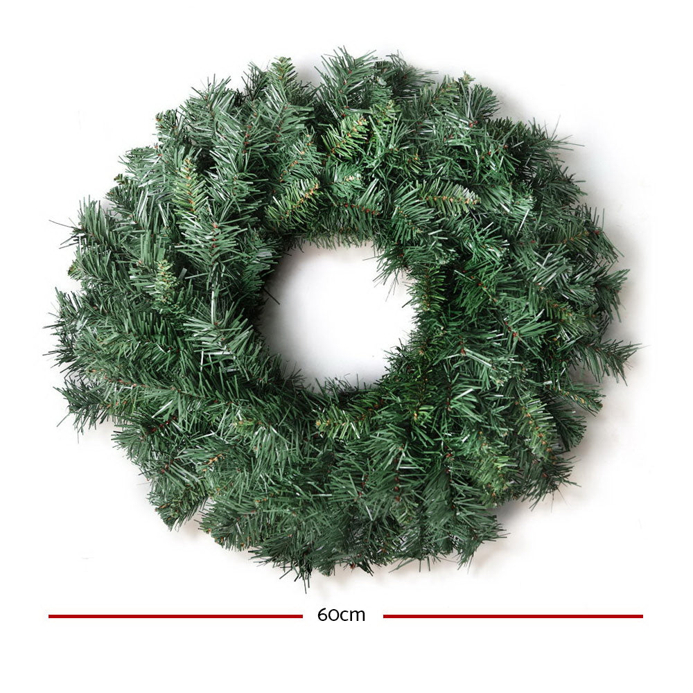 Green artificial pine Christmas wreath, full round foliage with inner opening
