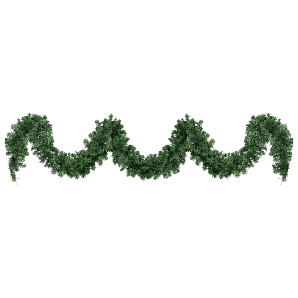 Green unlit Christmas garland with dense foliage and wavy swag shape