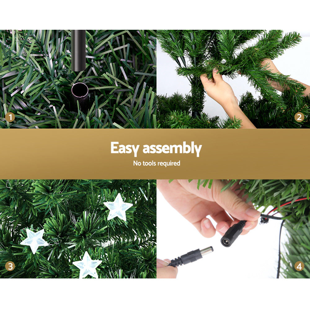 Artificial Christmas tree with optic fibre LED star decorations and plug-in connector