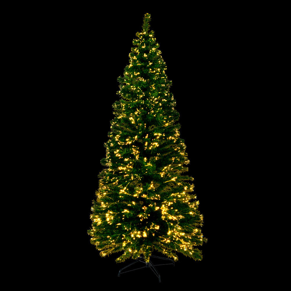 Artificial green Christmas tree with warm white optic fibre LED lights