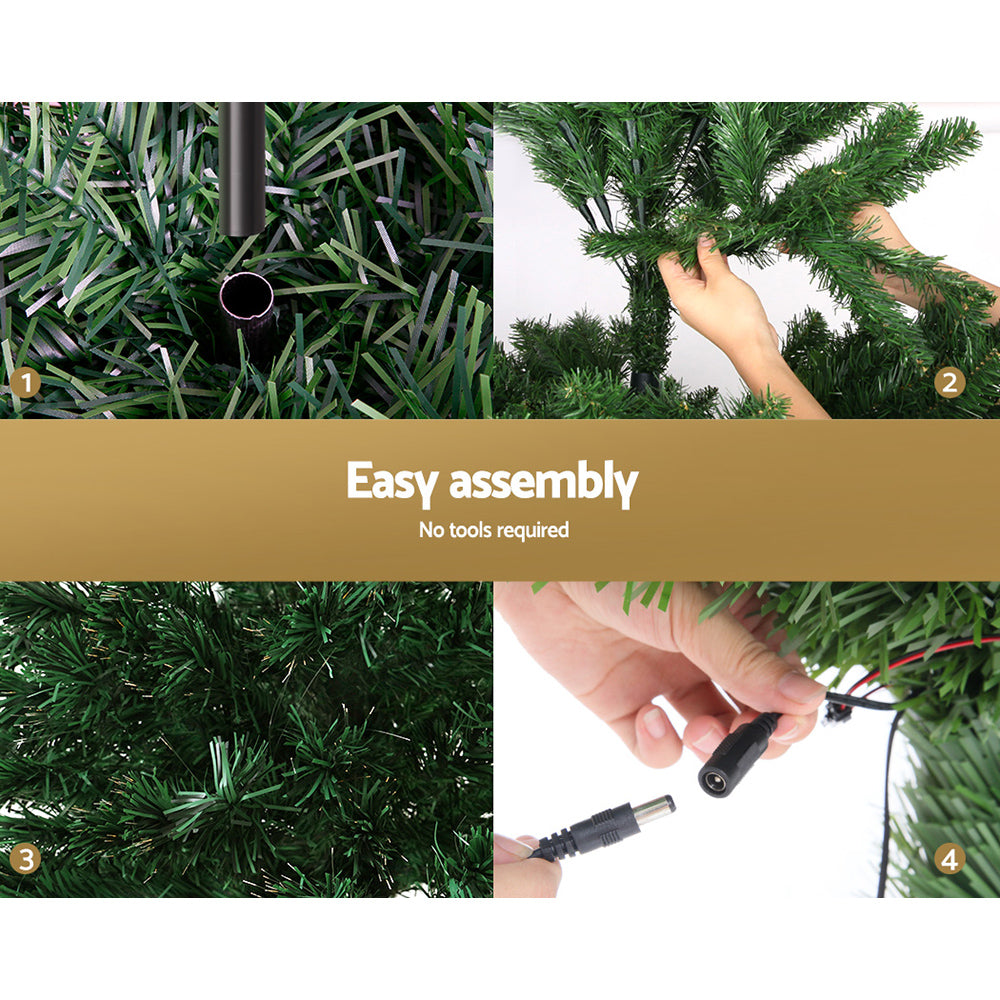 Green Christmas tree with warm white optic fibre LED lights; connector shown for assembly
