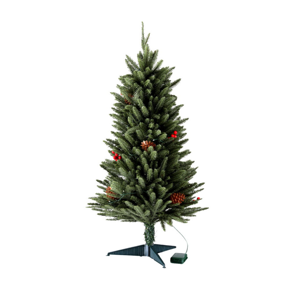 Mini Christmas tree with green needles, warm LED lights, and pinecone berry decorations