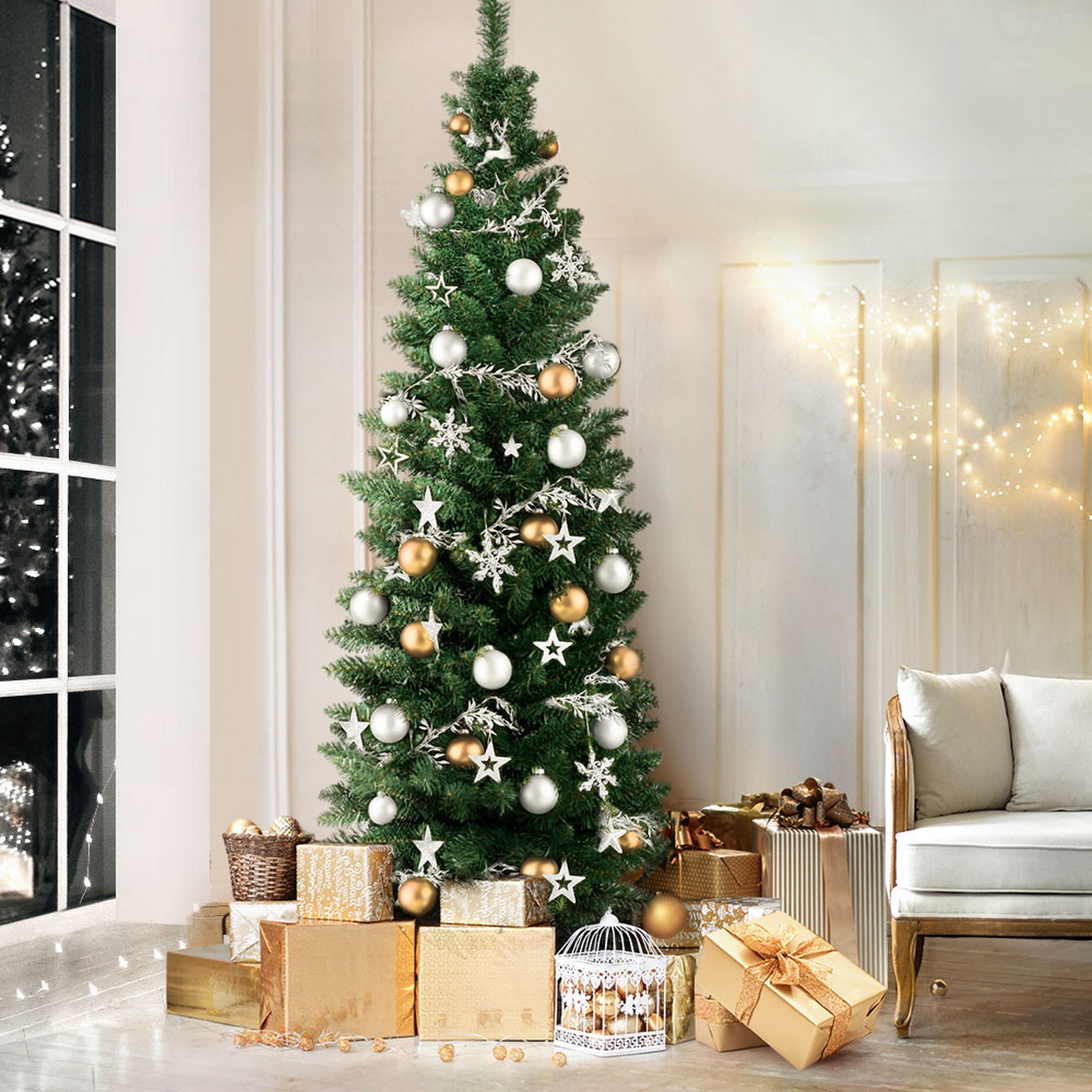 Decorated green Christmas tree with gold and white ornaments and twinkling lights