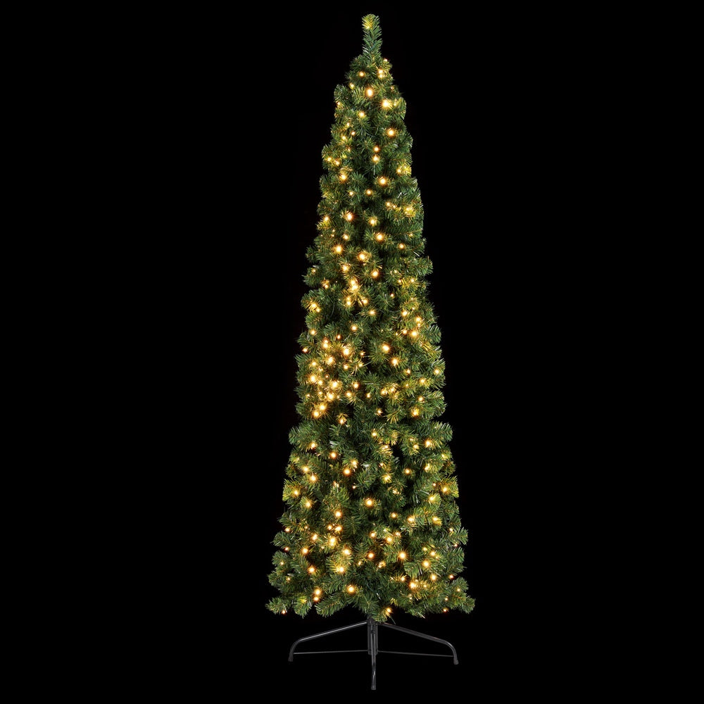 Lighted green artificial Christmas corner tree with warm yellow LED bulbs