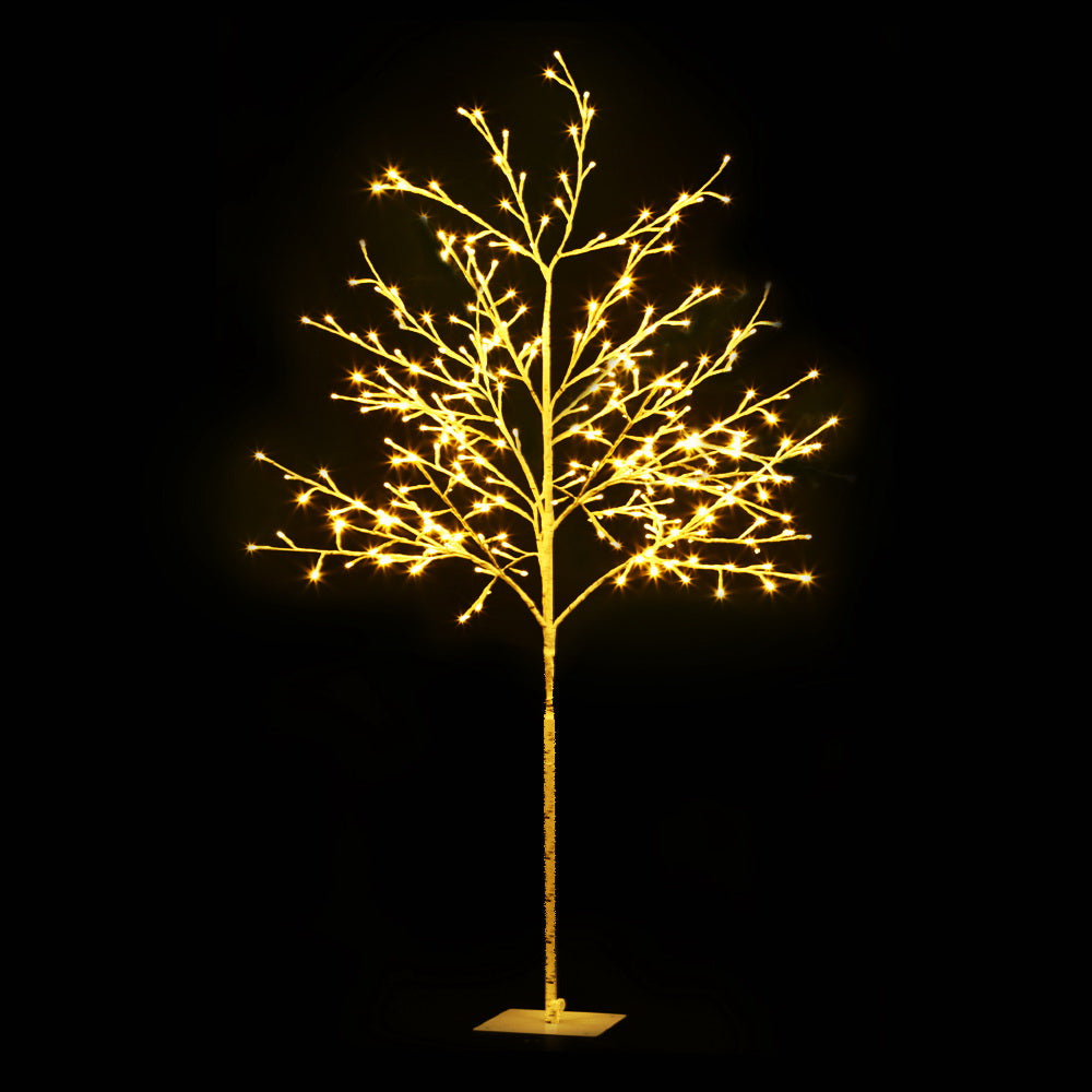 Lighted Christmas tree with warm white LED branches and base stand