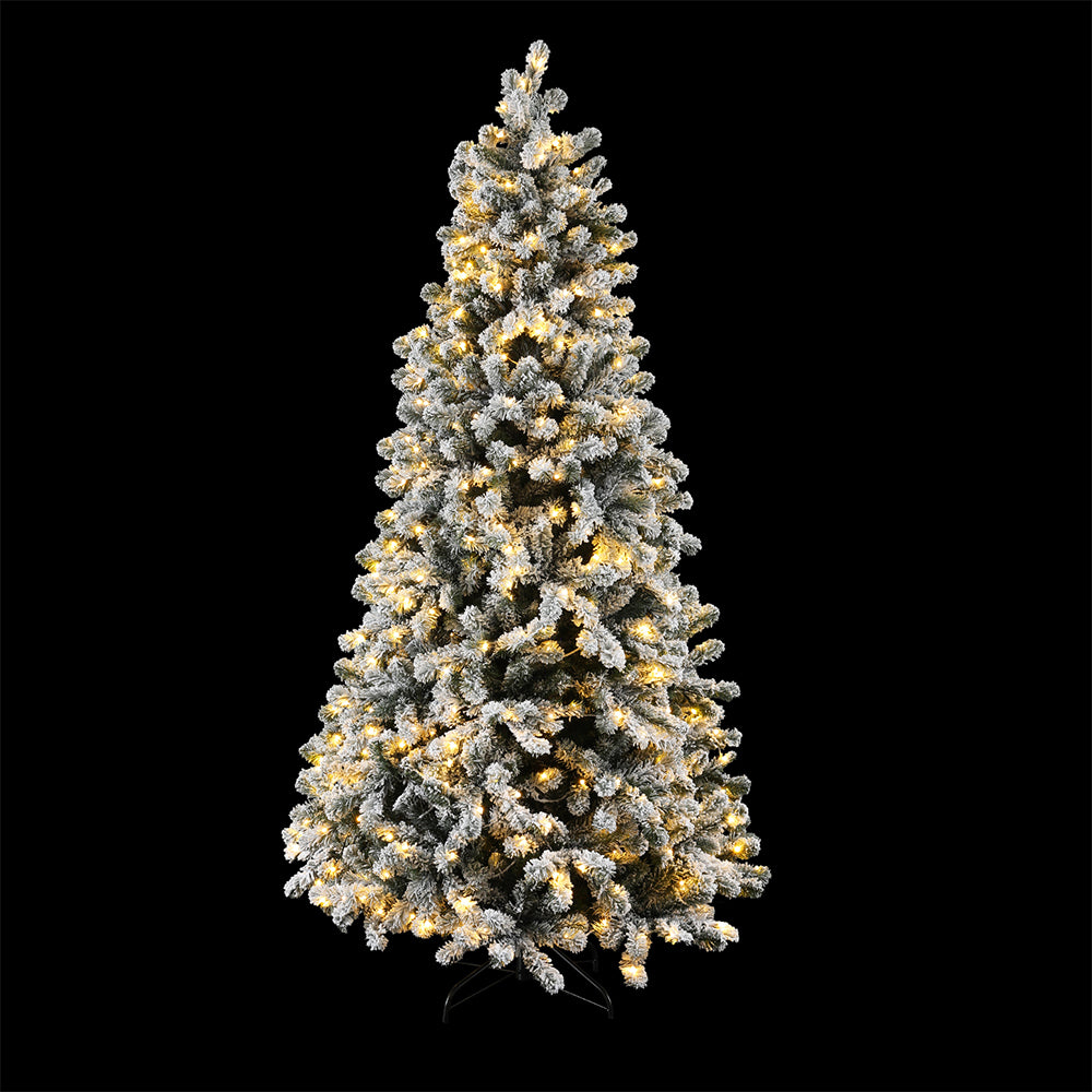 Snow-flocked Christmas tree with warm white LED lights, cone-shaped branches