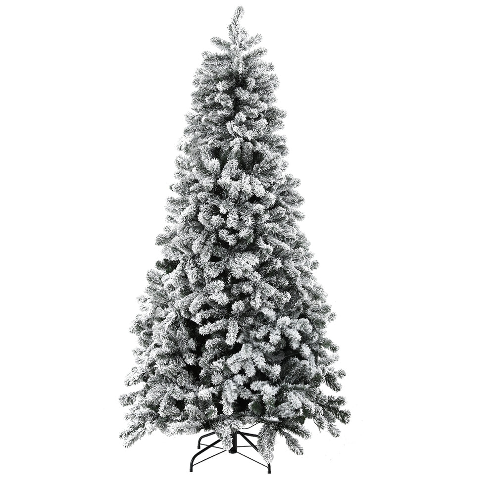 Snow-frosted Christmas tree with warm white LED lights on dense branches