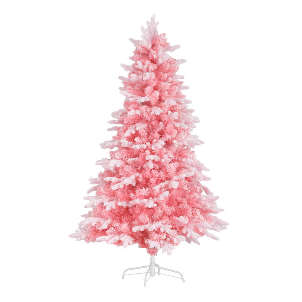 Pink snowy Christmas tree with fluffy, white-frosted branches