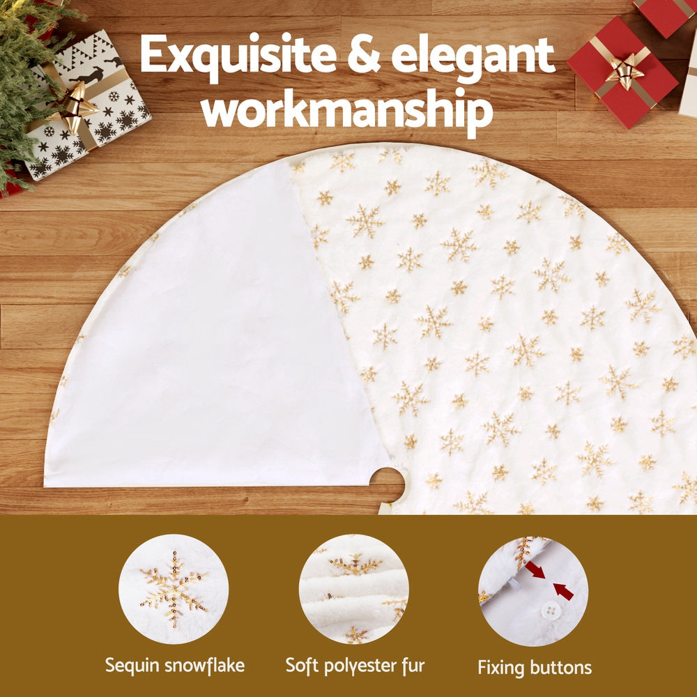 Christmas tree skirt with gold snowflake pattern and round cutout opening