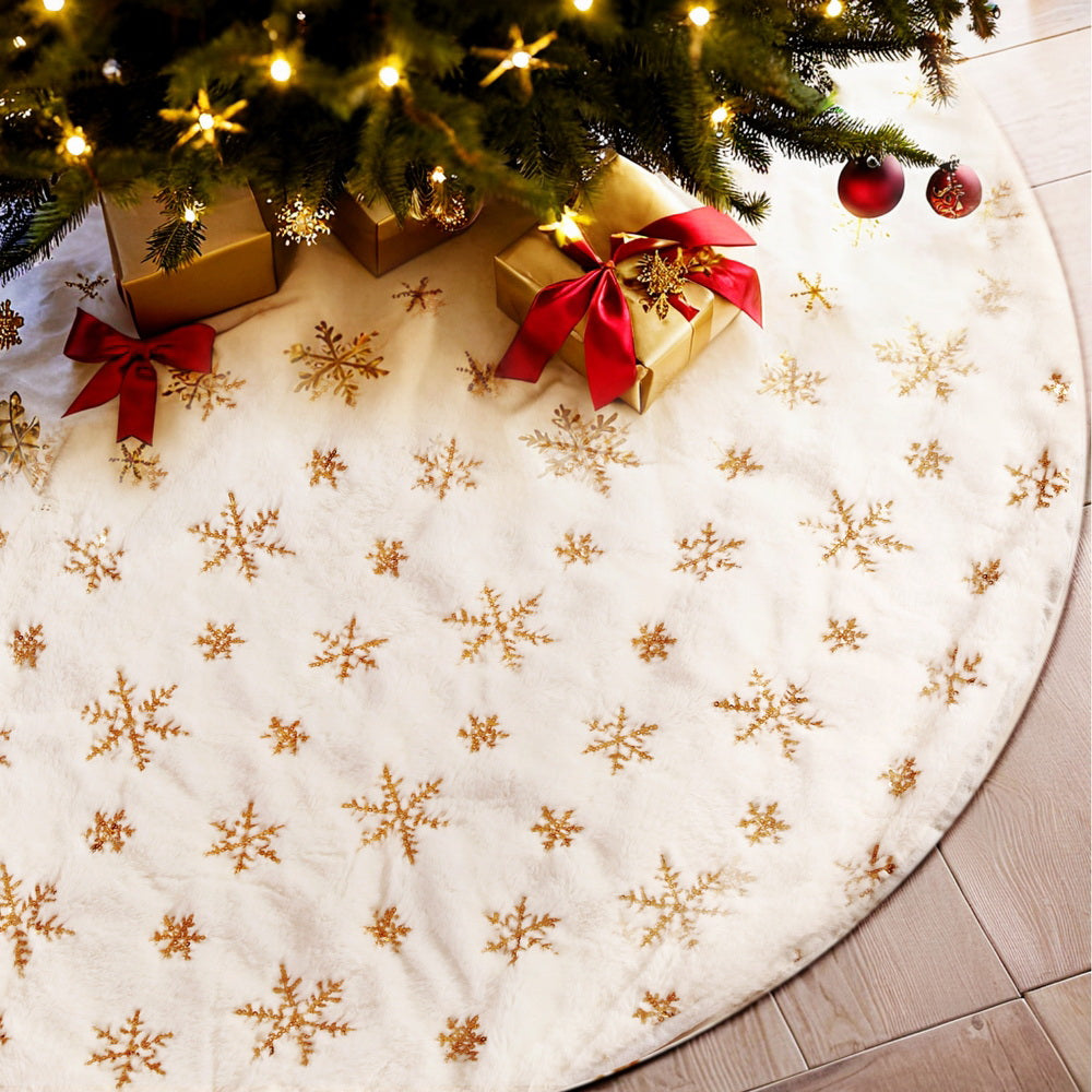 Round Christmas tree skirt, white with gold snowflake print and center hole