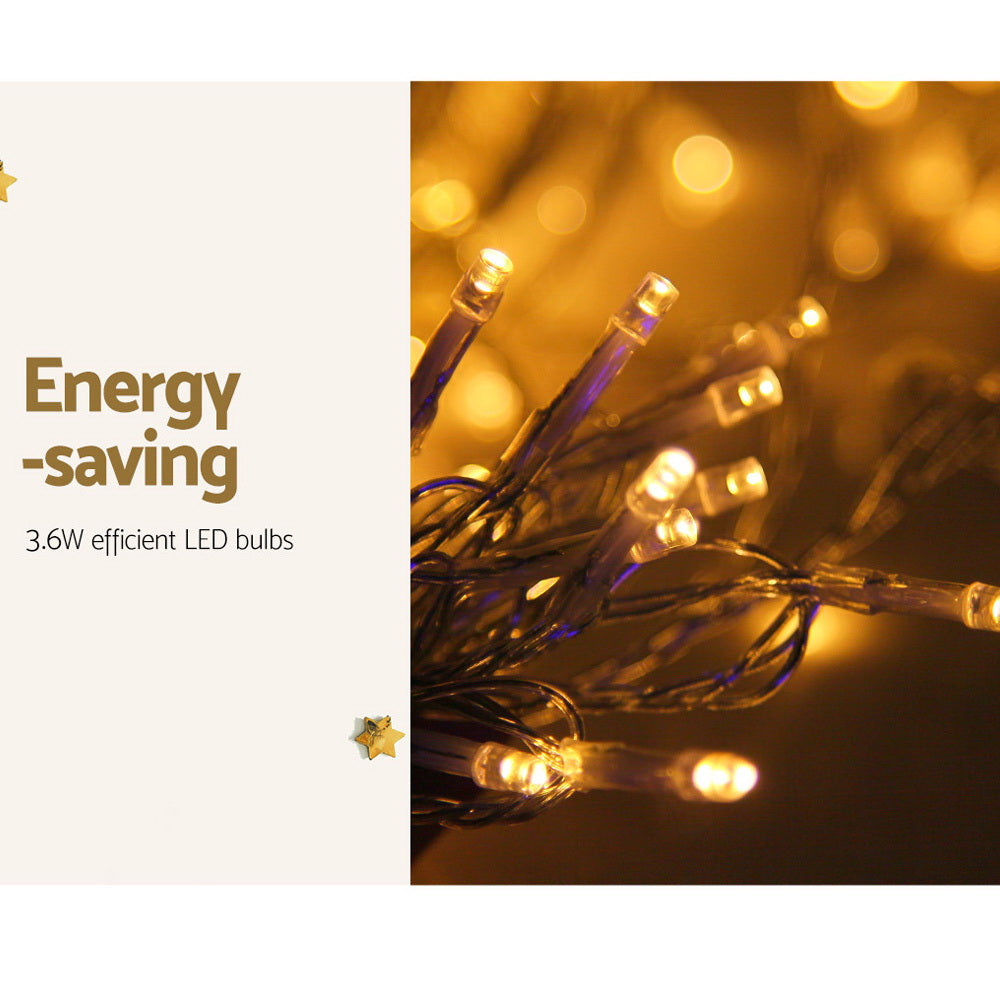 Warm white LED curtain lights with small glowing bulbs on a black wire strand