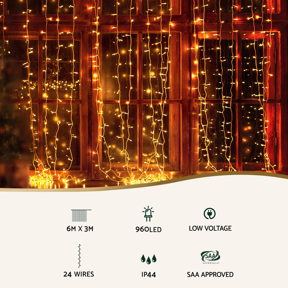 RGB LED curtain lights over window with multicolor and warm orange glow