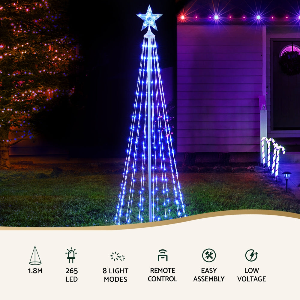 Outdoor LED fairy light tree with star topper, glowing blue and white