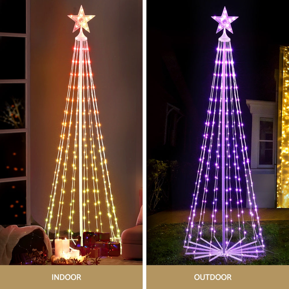 LED fairy light tree with star topper, lit in warm white and purple