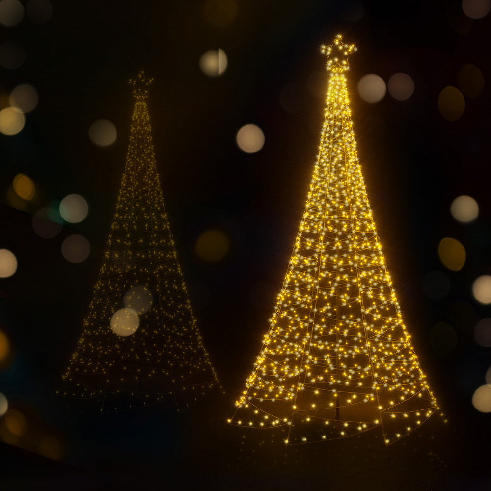 Two warm yellow LED net Christmas trees with star toppers glowing