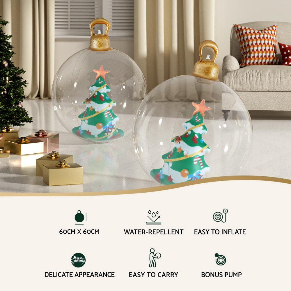 Pair of clear inflatable Christmas baubles with gold handles and tree designs