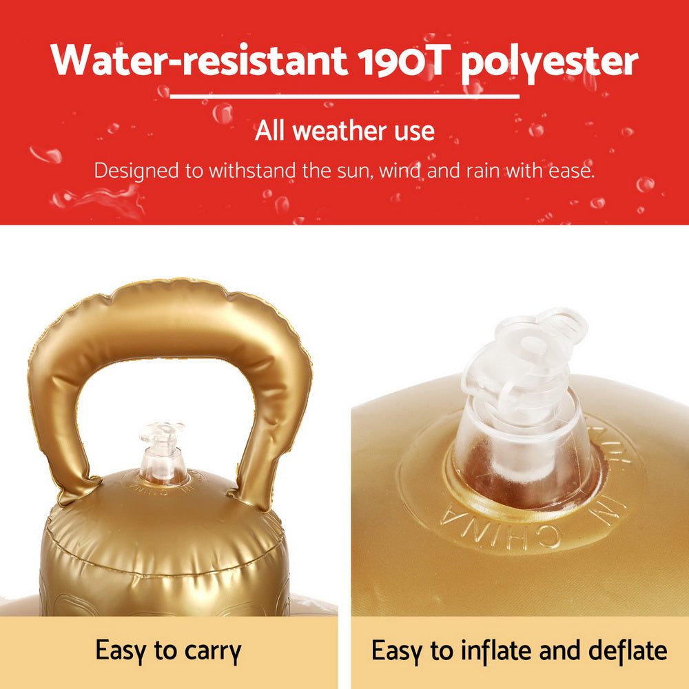 Gold carry handle on clear inflatable Christmas bauble with tree design